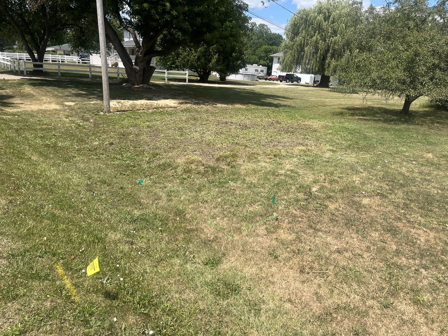 After: the same yard cleared, cut down, and leveled out